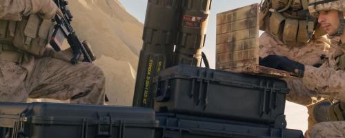 Soldiers with cargo and equipment in the field